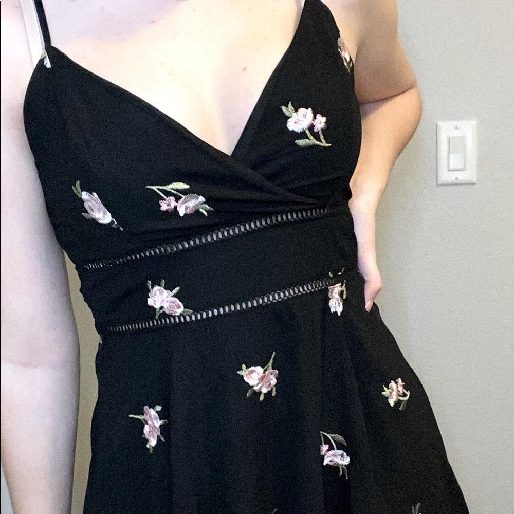 Francesca Black Dress with pink flowers on it